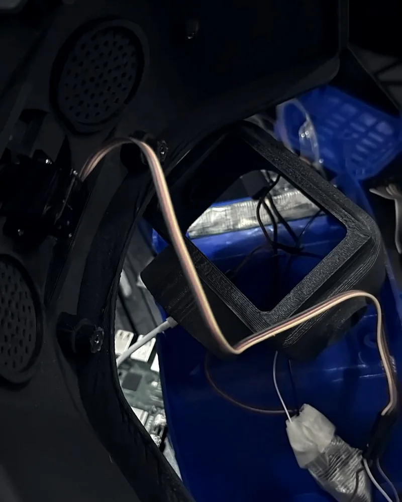 Inside the V1 body: servo, speaker grilles and wiring