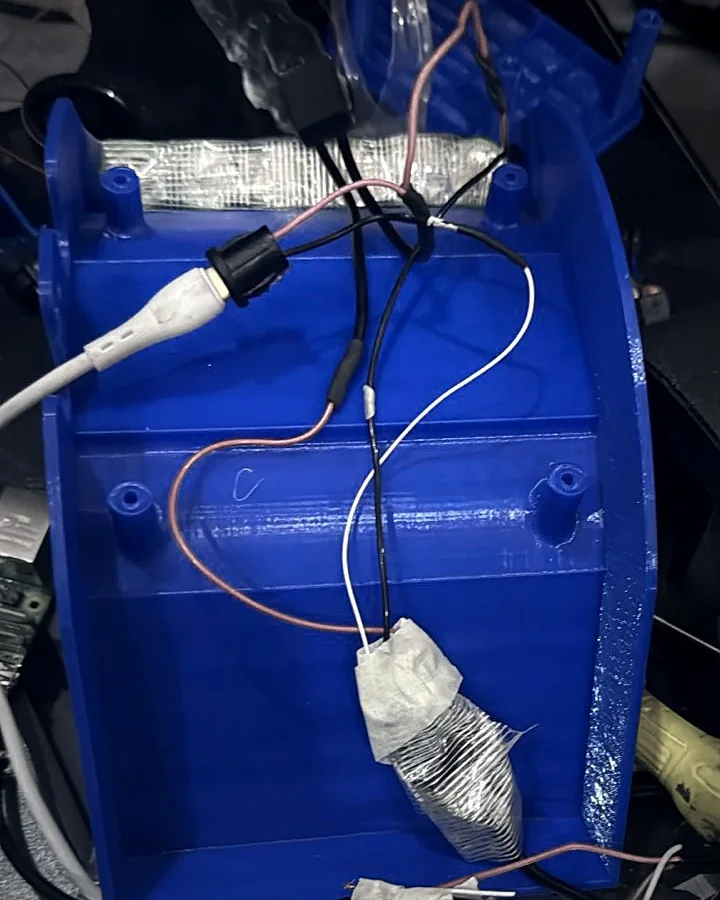 The blue inner chassis of V1 with power wiring